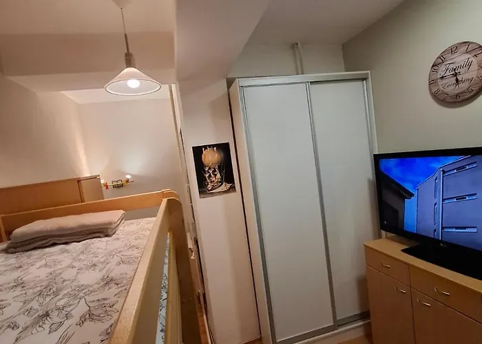 Апартаменты By River In